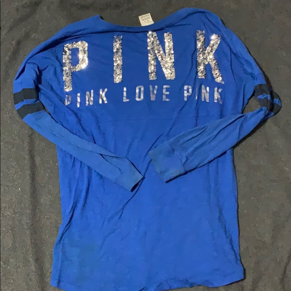 Kind of worn pink long sleeved